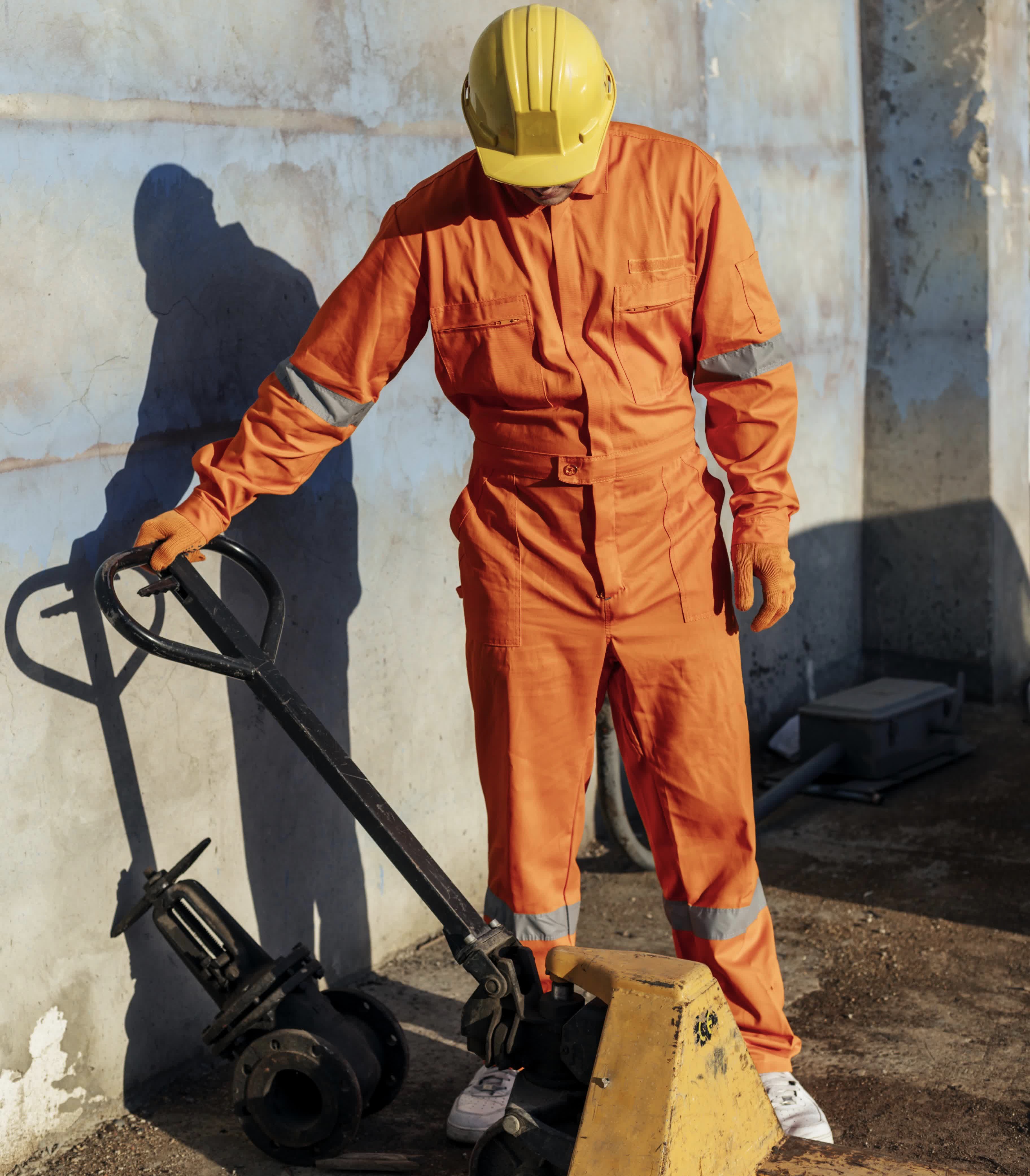 front view-of-worker-with-hard-hat-and-uniform