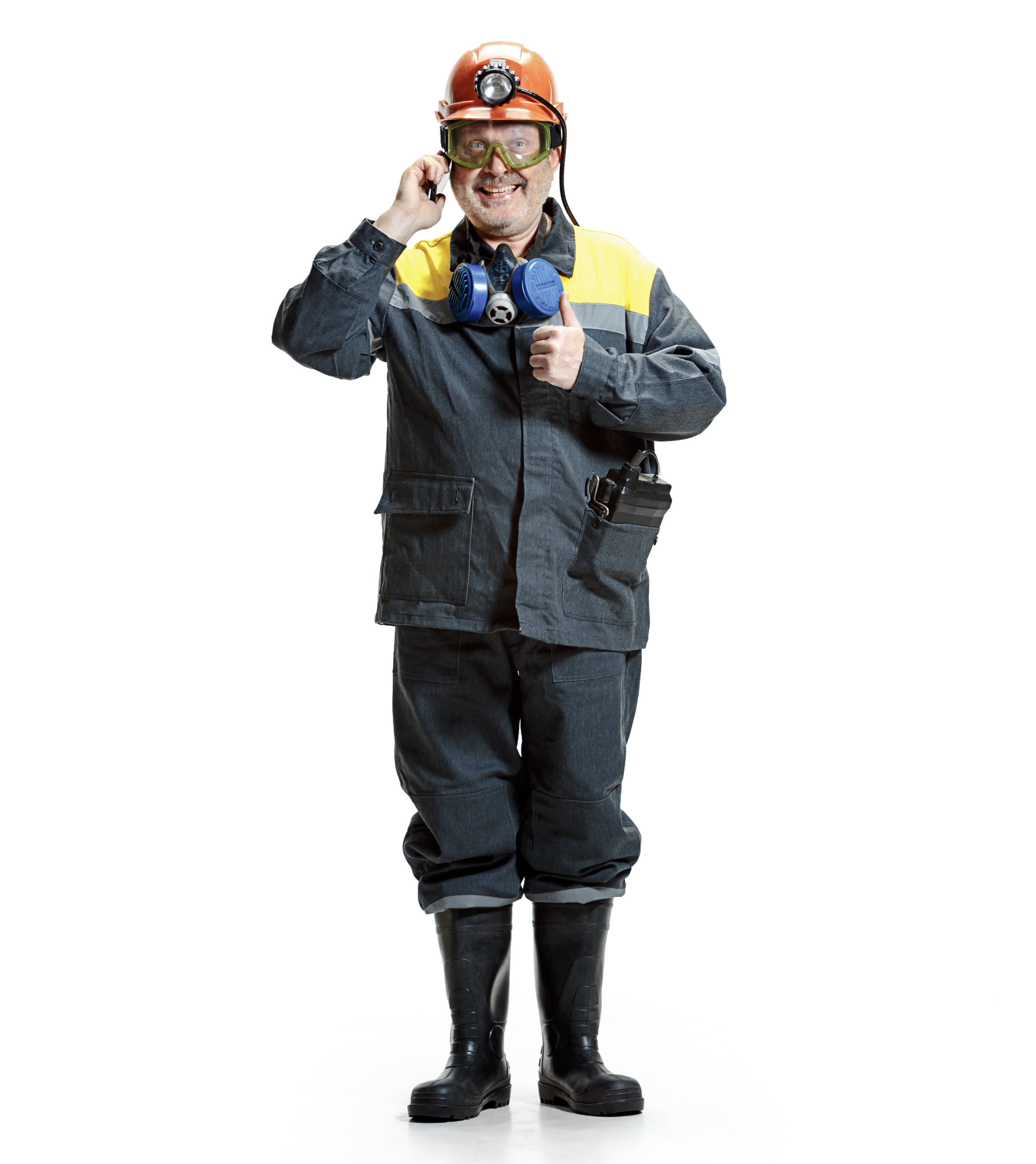 happy senior-bearded-male-miner-standing-at-the-camera-with-smartphone-on-a-white