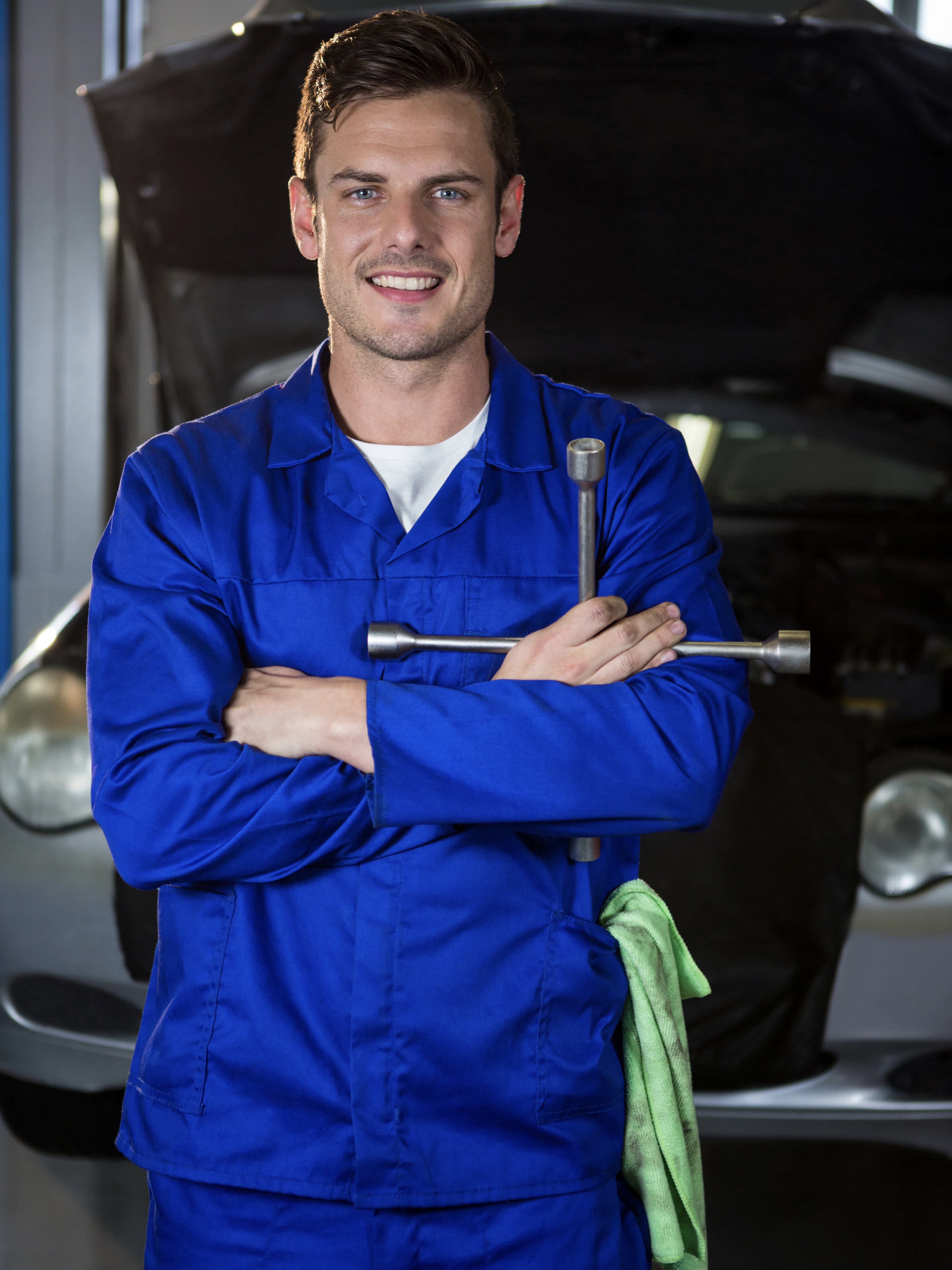 portrait of-mechanic-holding-lung-wrench